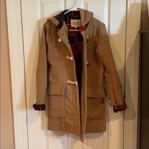 Tan wool jacket with red plaid inside